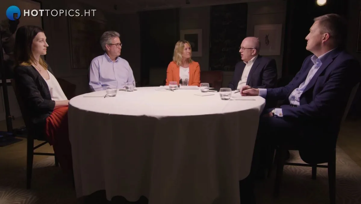 Marketing leaders seated around a table at the Hot Topics round table debate